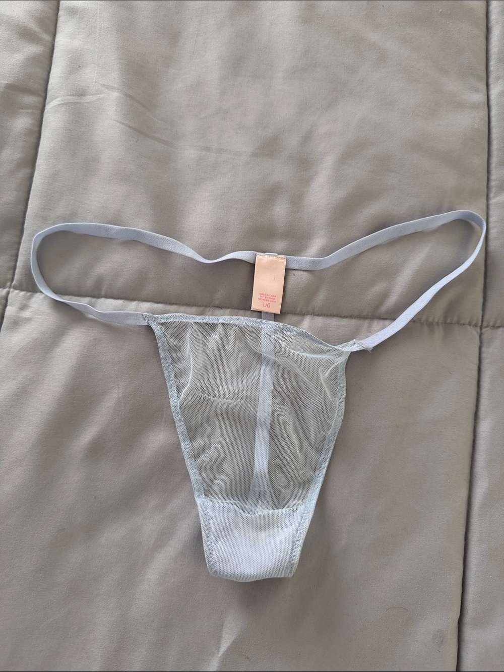 Large Victoria’s Secret light blue mesh thong